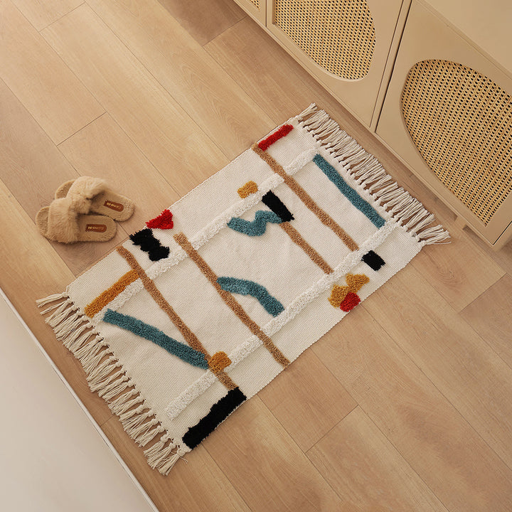 Woven rug in Boho-minimalist style with contrasted tufting and cotton fringes