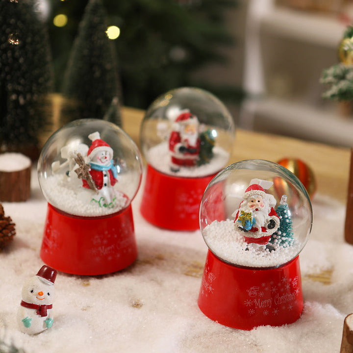 Snow globe with Santa Claus and Christmas tree