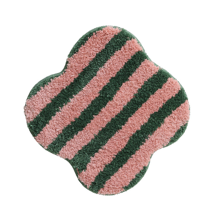 Shaped high pile bath mat with diagonal stripe structure