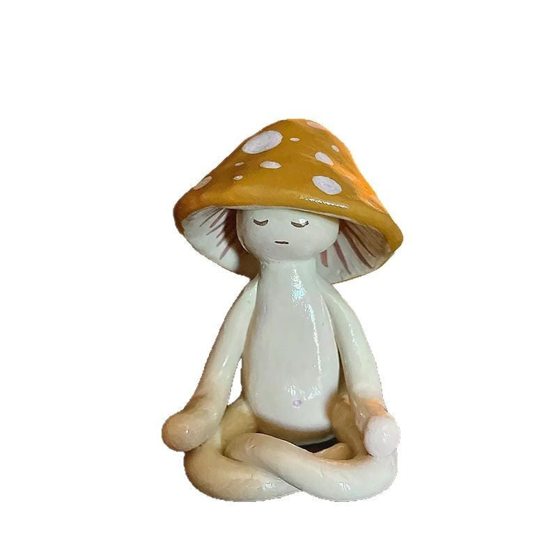 Decorative figure of a meditating mushroom