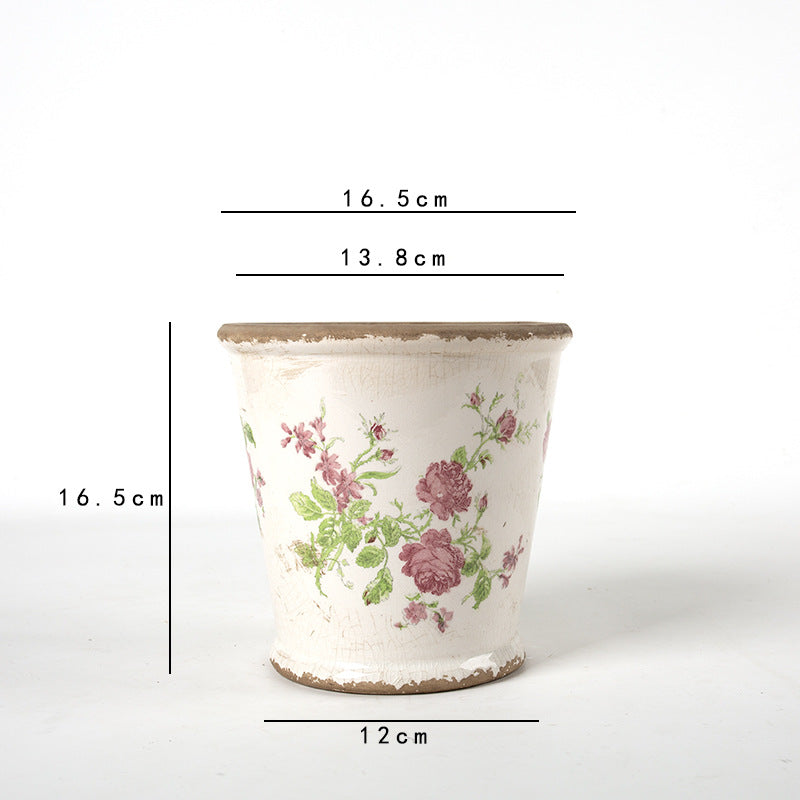 Decorative ceramic flower pot with floral design
