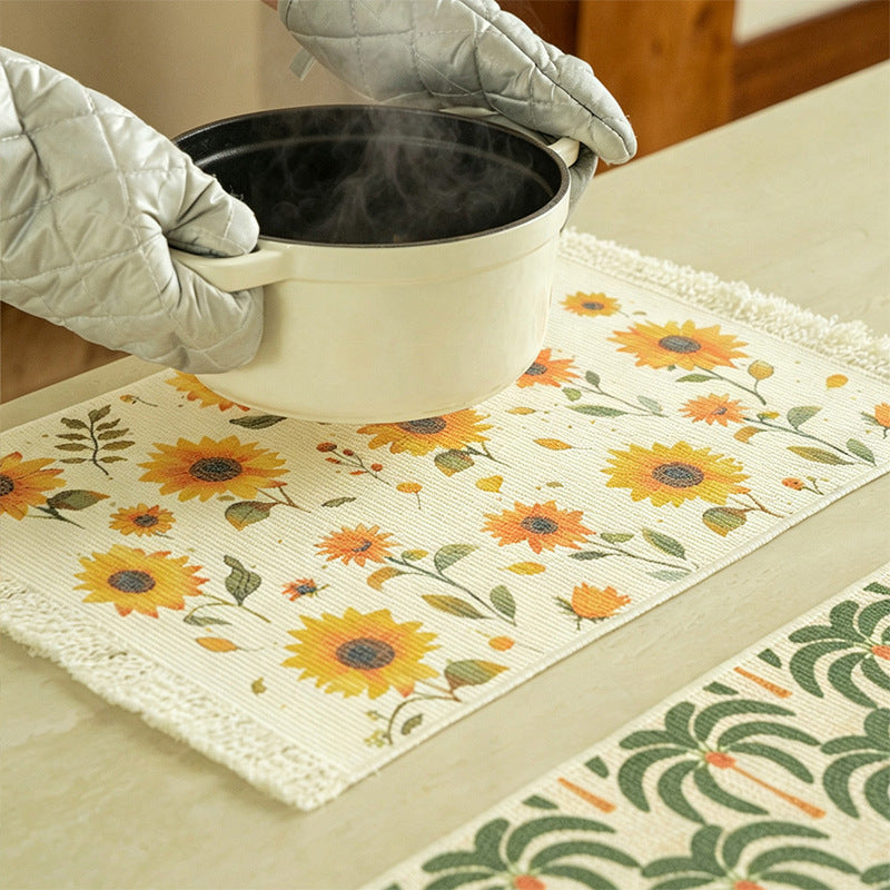Rectangular woven rug in tropical palm pattern with flat weave and fringes