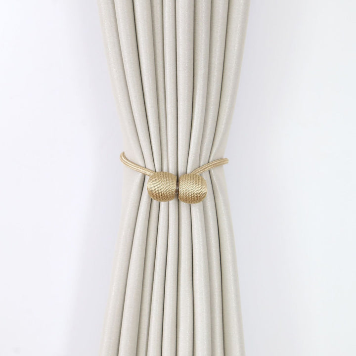 Decorative curtain tieback