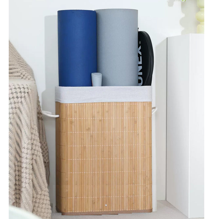 Stylish laundry container with practical lid and carrying handles