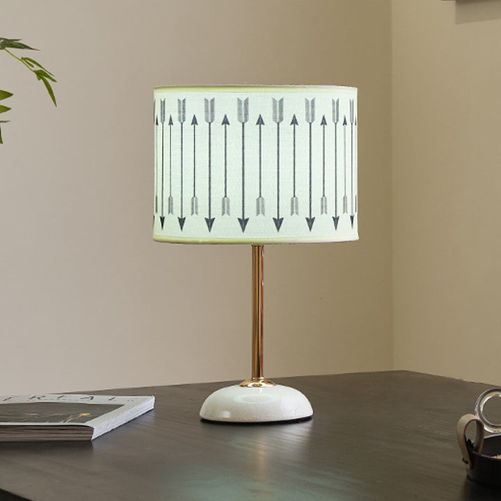 Ceramic base bedside lamp with fabric shade in arrow pattern