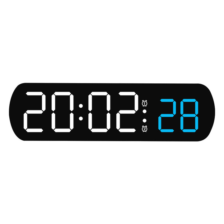 Digital radio alarm clock with multicolored LED display