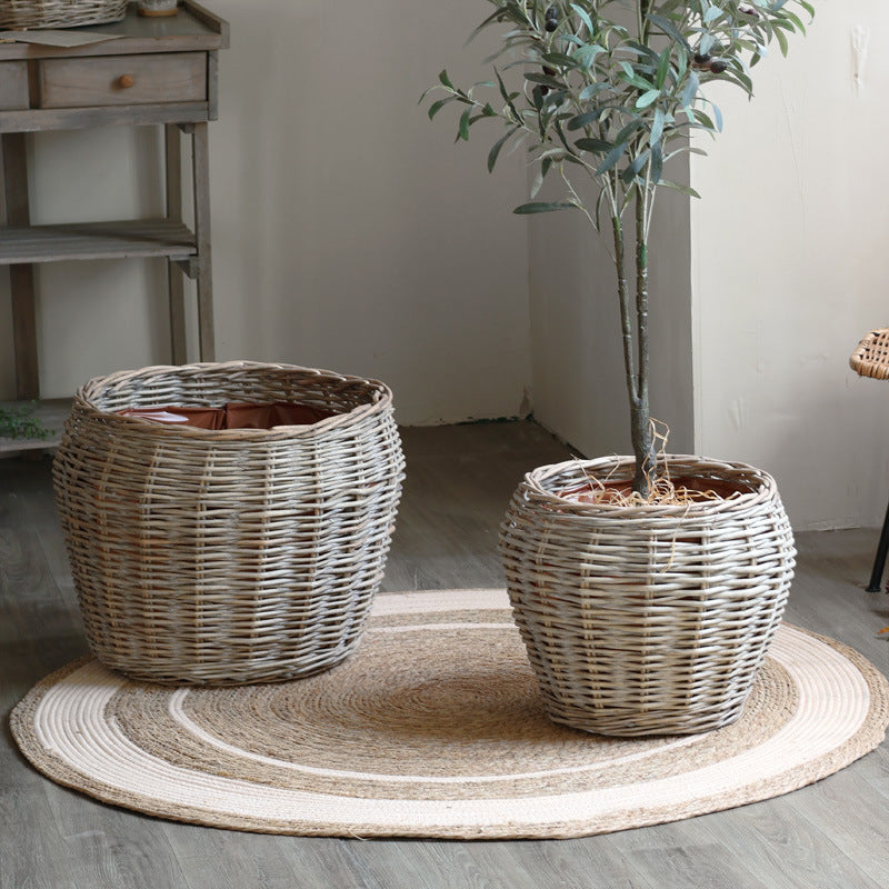 Stylish laundry basket made of braided natural material