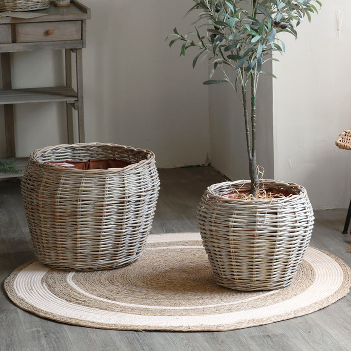 Stylish laundry basket made of braided natural material