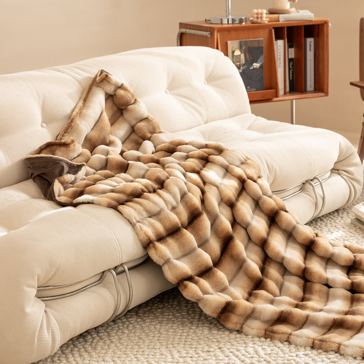 Luxurious cozy faux fur blanket with quilted relief pattern