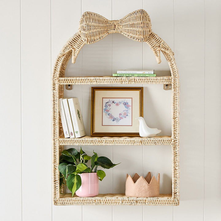 Playful wall shelf in butterfly design