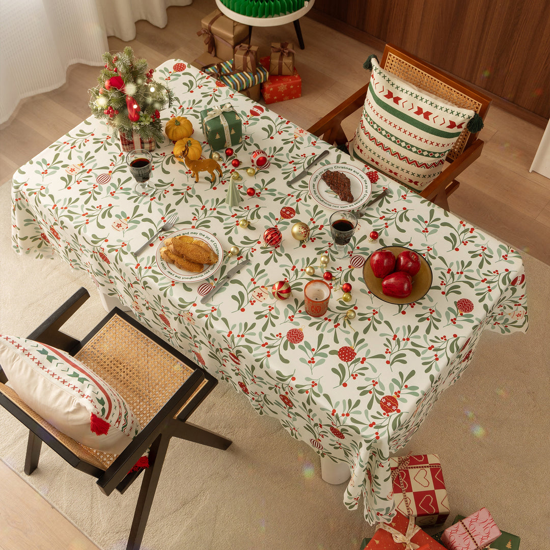 Festive tablecloth with wavy hem and mistletoe branch print
