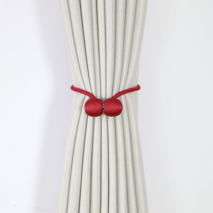 Decorative curtain tieback