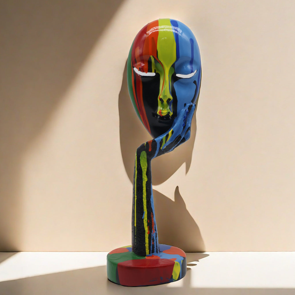 Artful decoration in the form of a contemplative figure