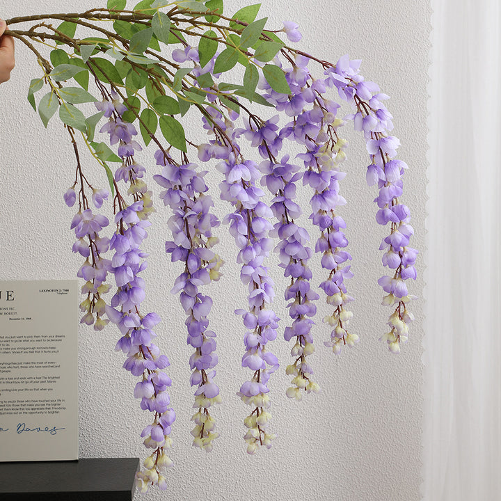 Artificial flower branch with elegant flowers
