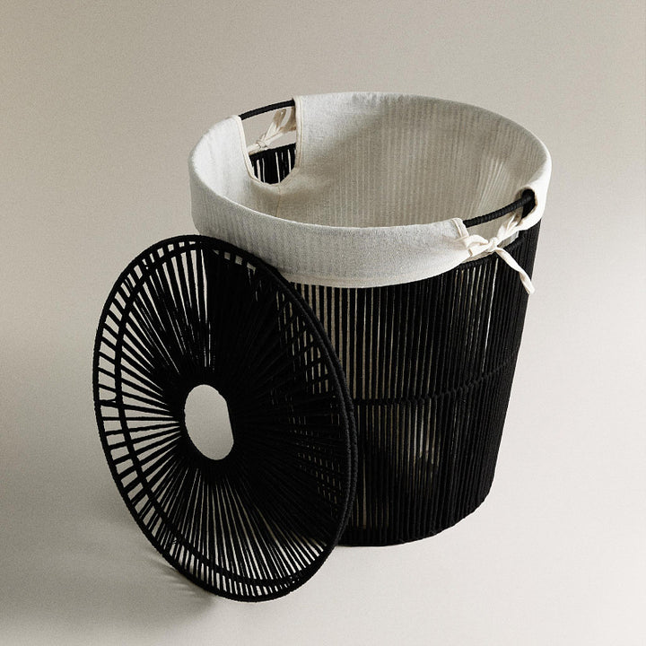 Stylish laundry basket with decorative cover