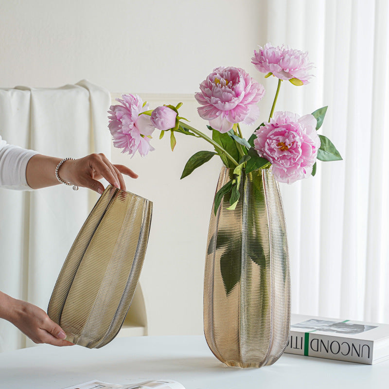 Decorative glass vase with ribbed structure