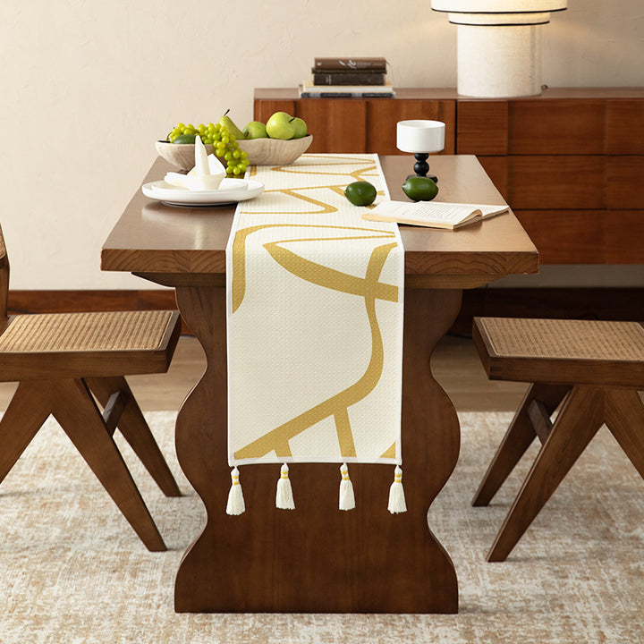 Light waffle texture throw blanket with geometric print and tassels