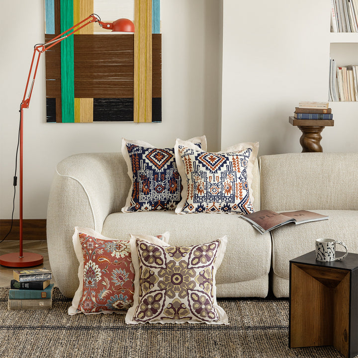 Square decorative cushion with mandala-like jacquard pattern and linen flange
