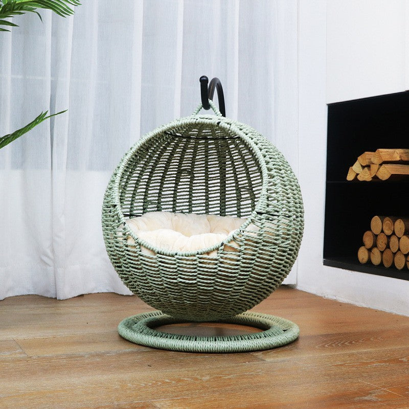 Hanging chair made of rattan with comfortable cushion