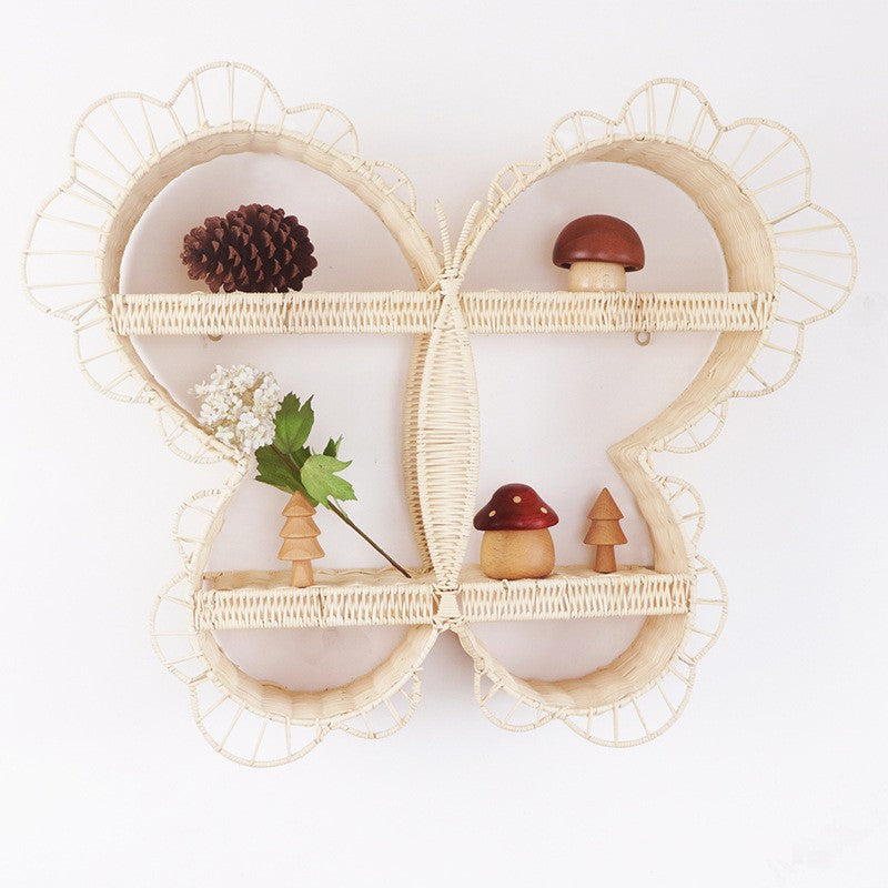 Playful wall shelf in butterfly design