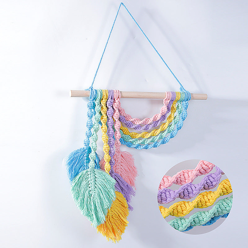 Macramé wall decoration with colorful fringe