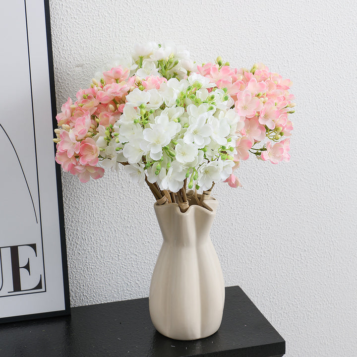 Artificial flower bouquet with delicate blooms