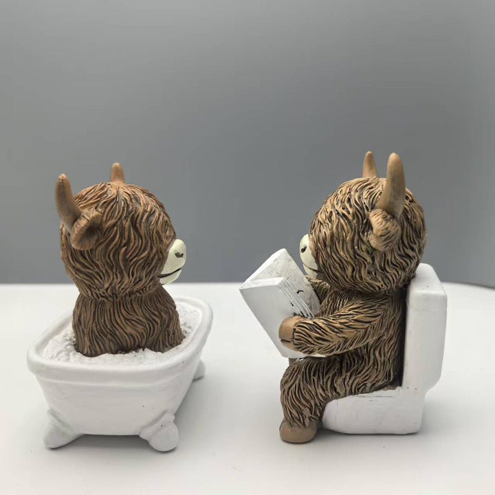 Funny decorative figure of a Highland cow in a bathtub