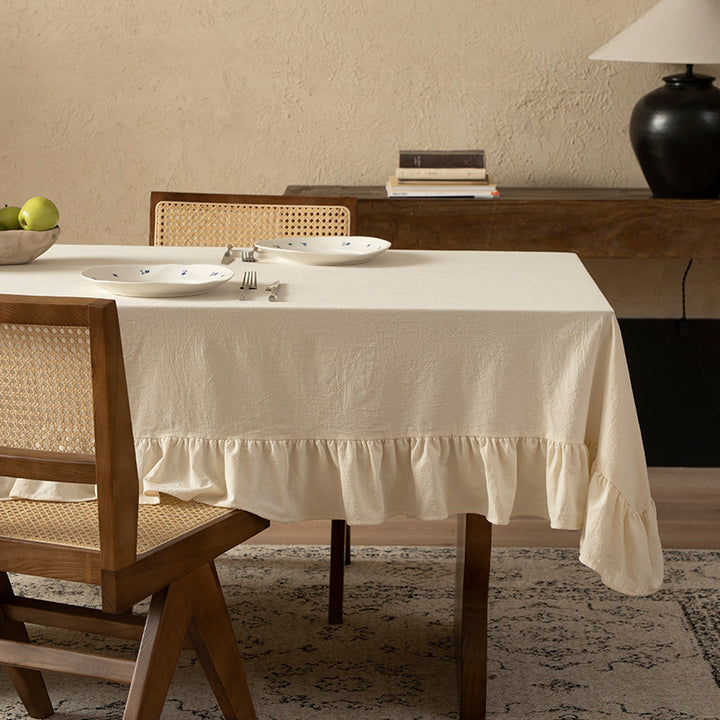 Rectangular decorative tablecloth with gathered flounce and light linen look