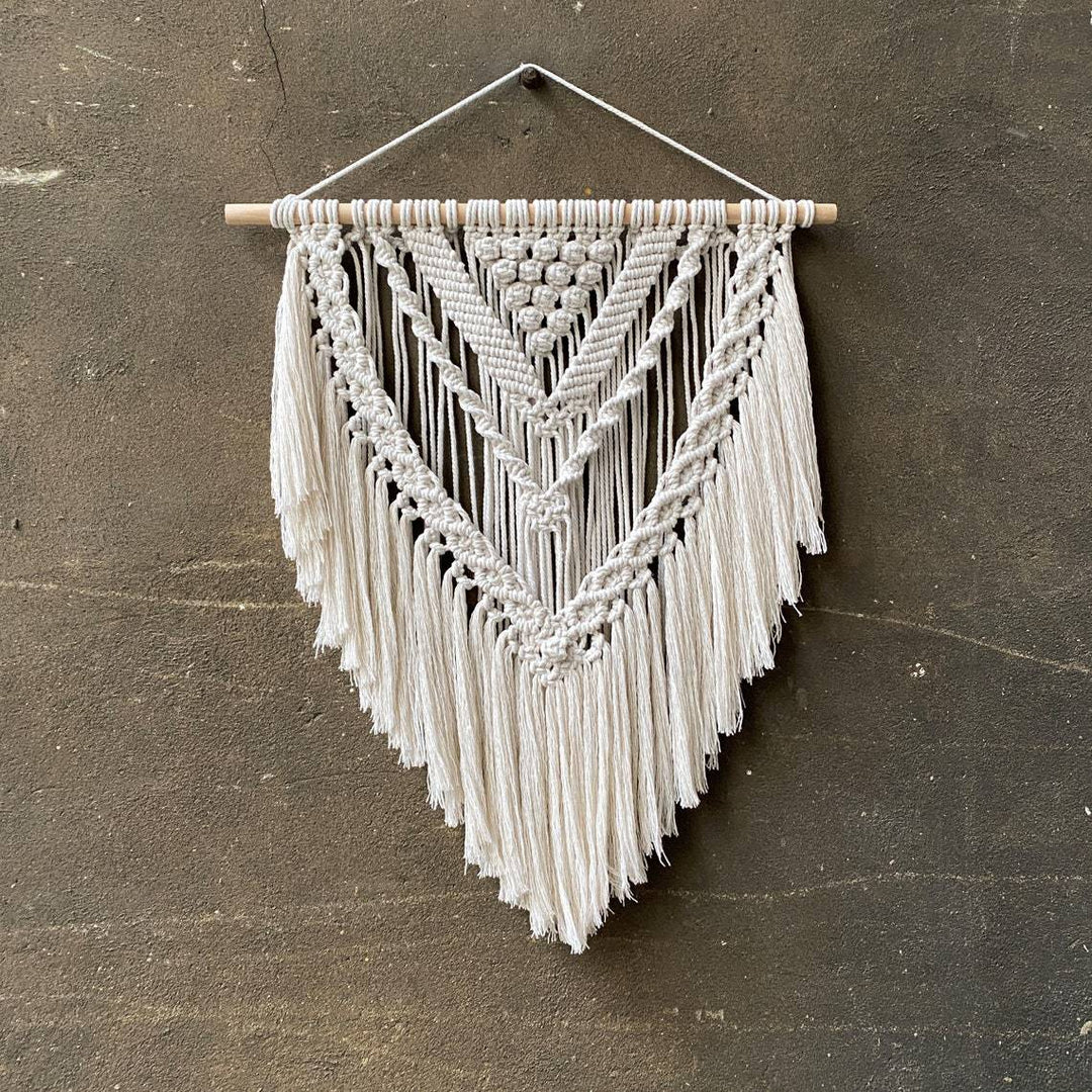 Macramé wall decoration with creative fringes