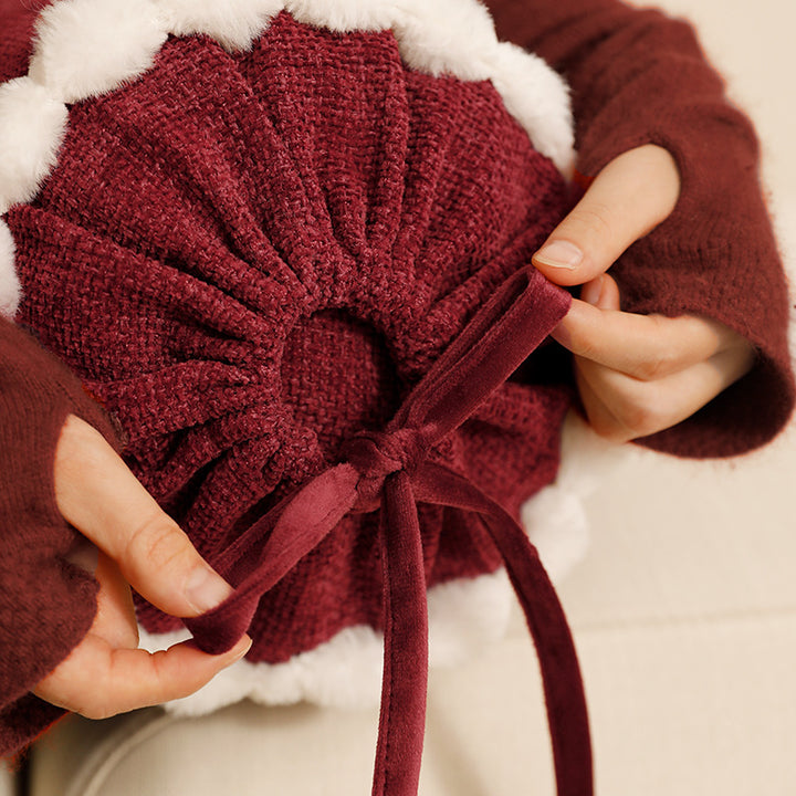 Cylindrical lumbar and neck pillow with velvety chenille surface and crocheted trim
