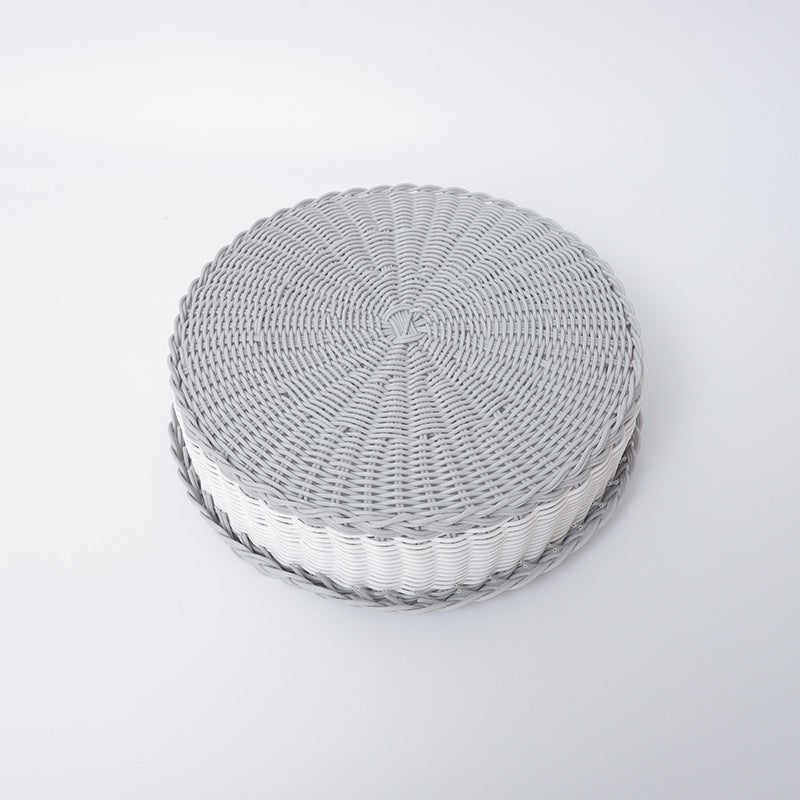 Handwoven storage basket with decorative edge