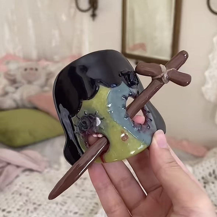 Decorative chopstick holder in bat design