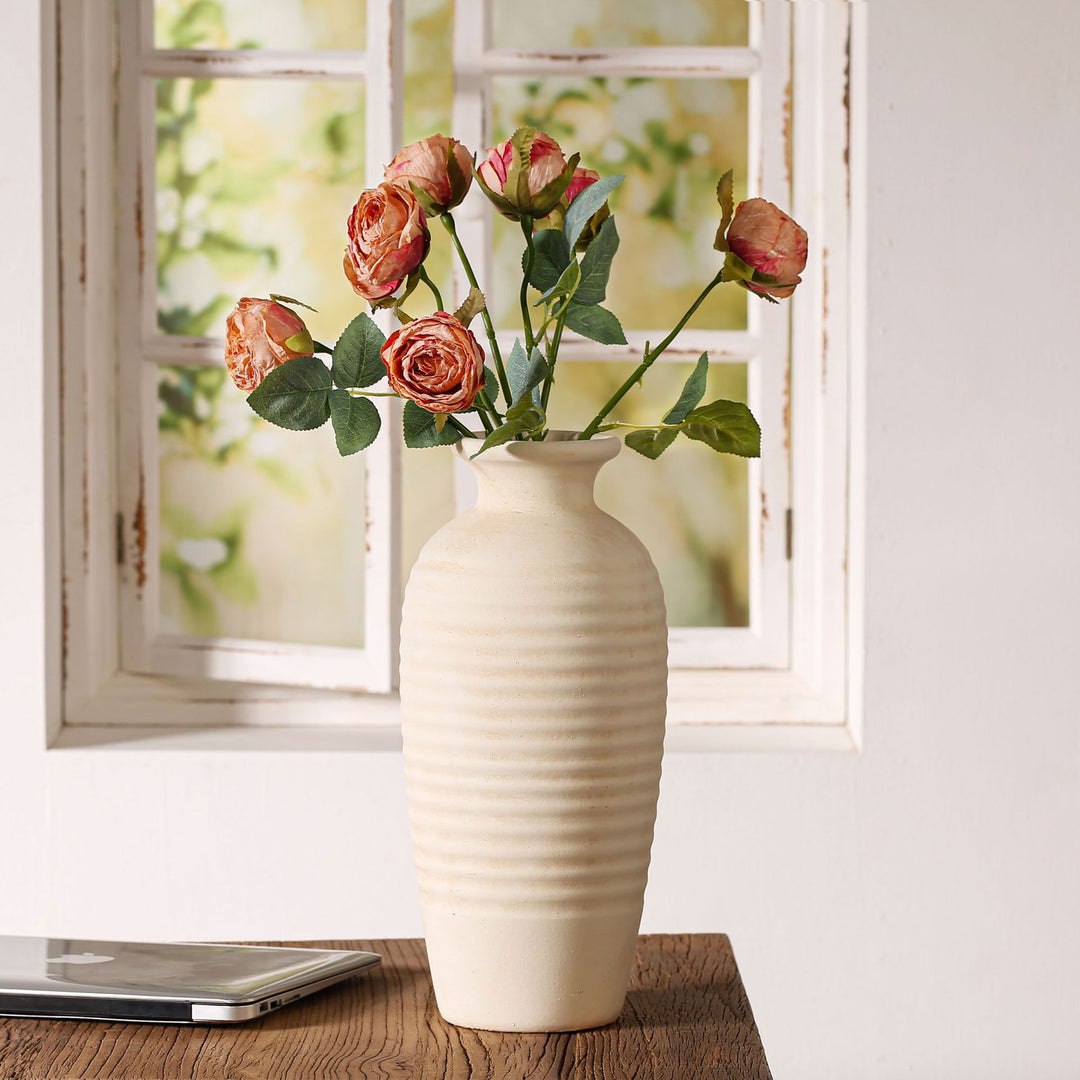 Handcrafted ceramic vase with ribbed structure