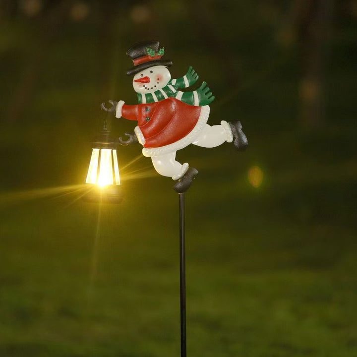 Solar-powered decorative garden stake light with crescent moon fairy lantern