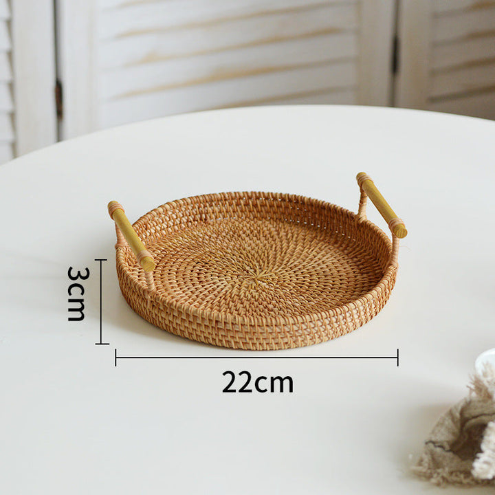Round serving platter made of braided rattan