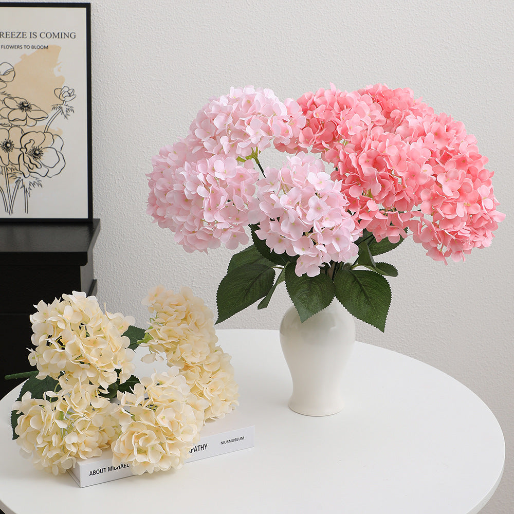 Decorative artificial flower arrangement
