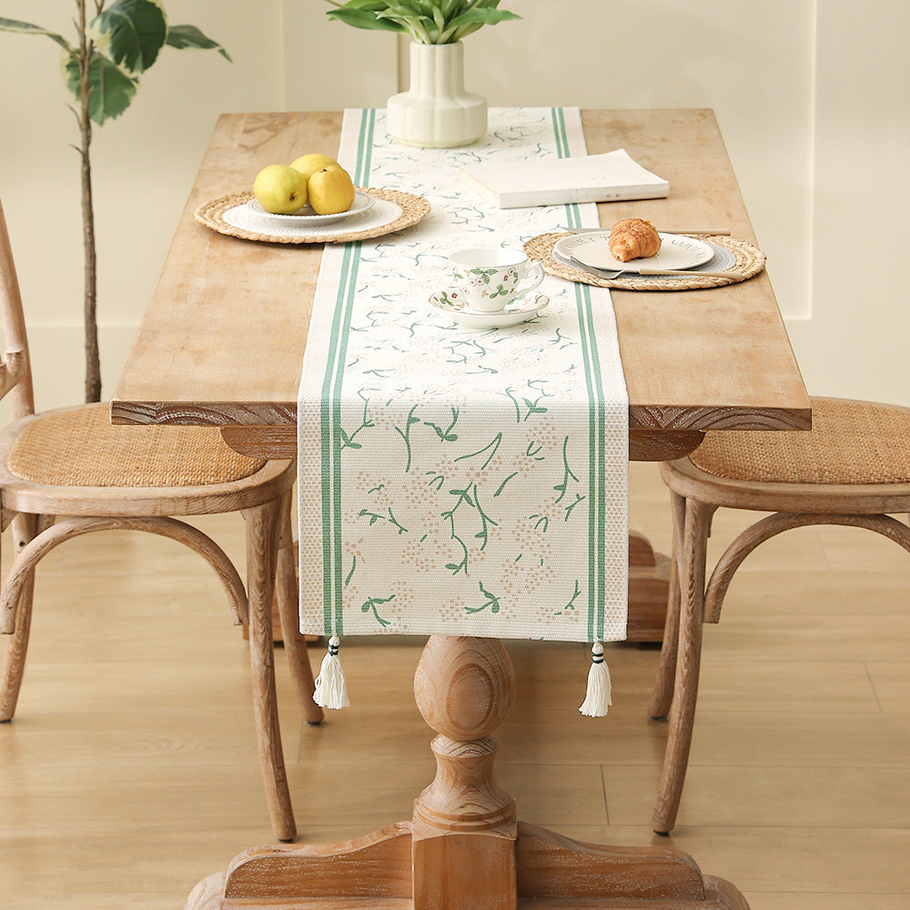 decorative table runner made of woven cotton with tassels