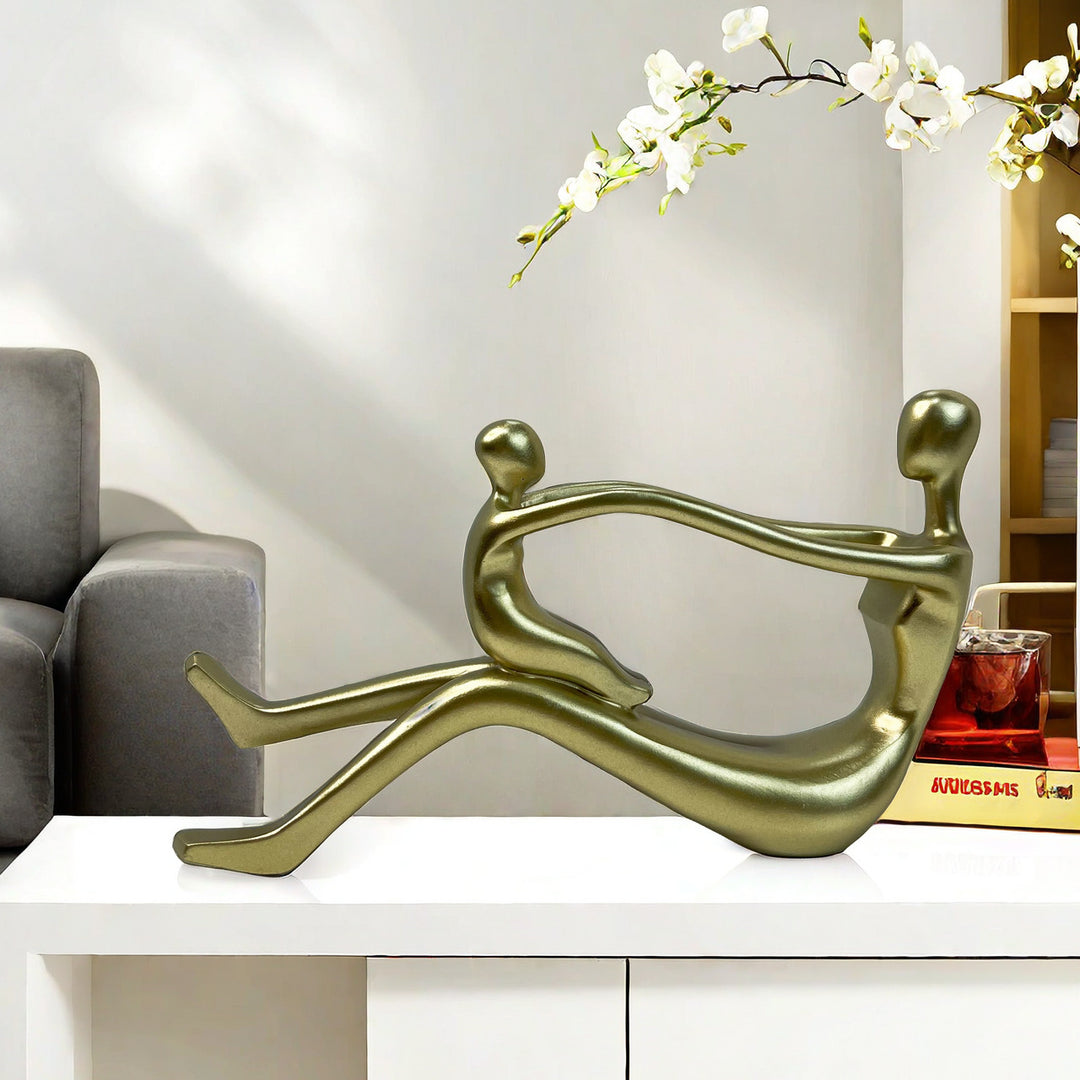 Stylish sculpture with intertwined figures