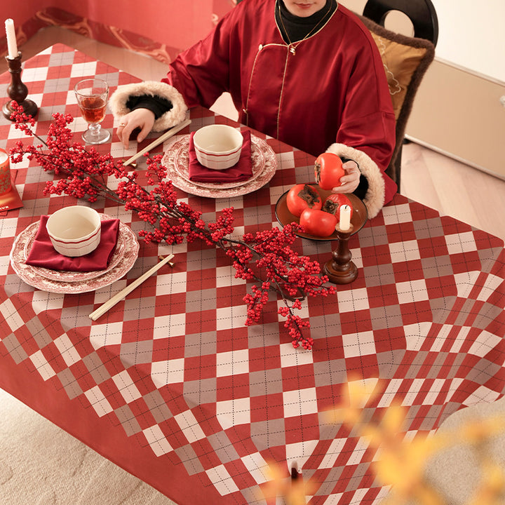 Printed rectangular tablecloth made of easy-care polyester with decorative hem border