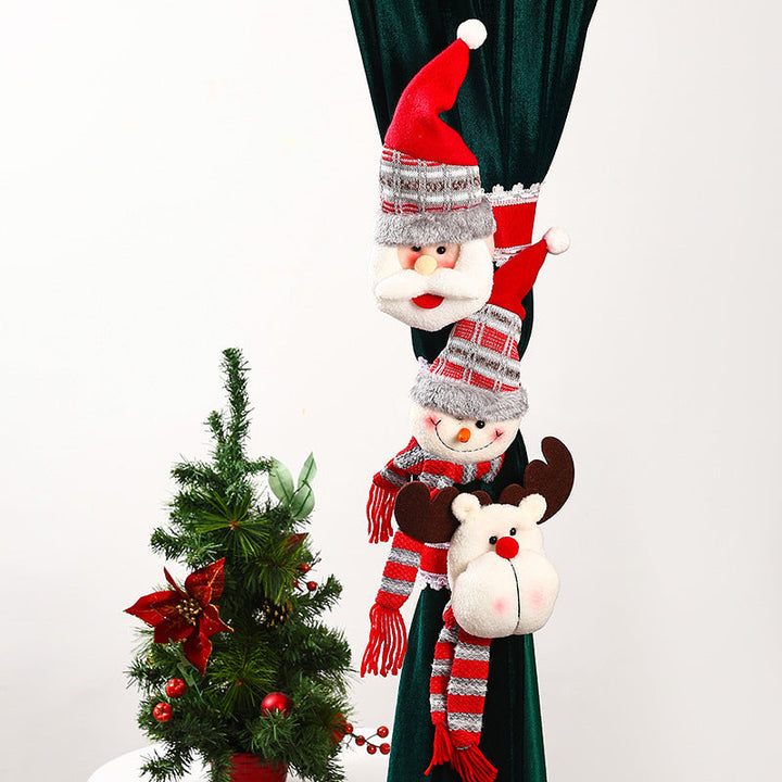 Decorative curtain holder with Christmas moose motif