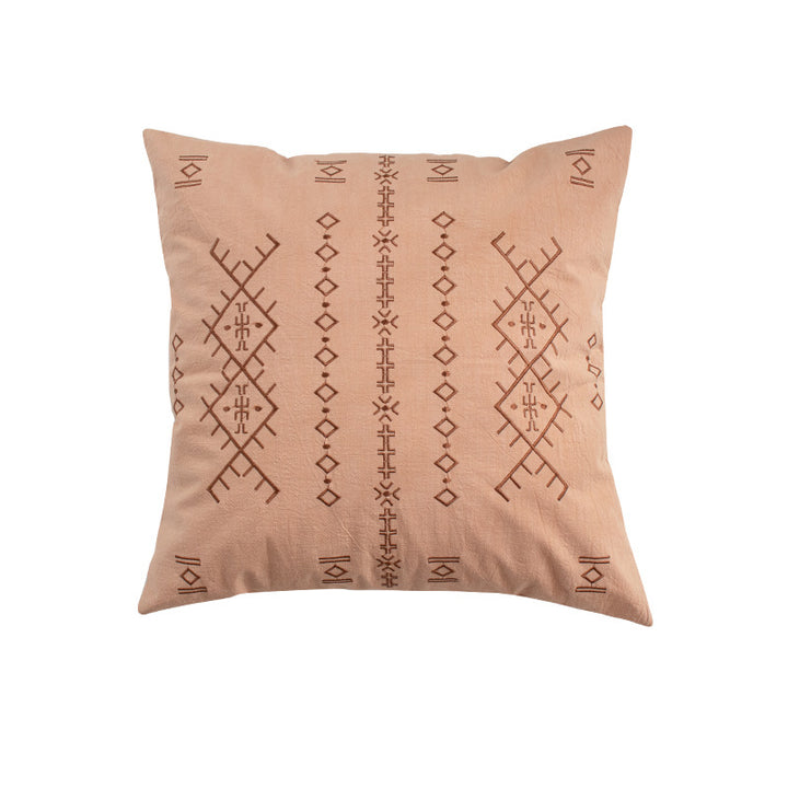 Square decorative cushion with fine relief embroidery in ethnic design and removable cover