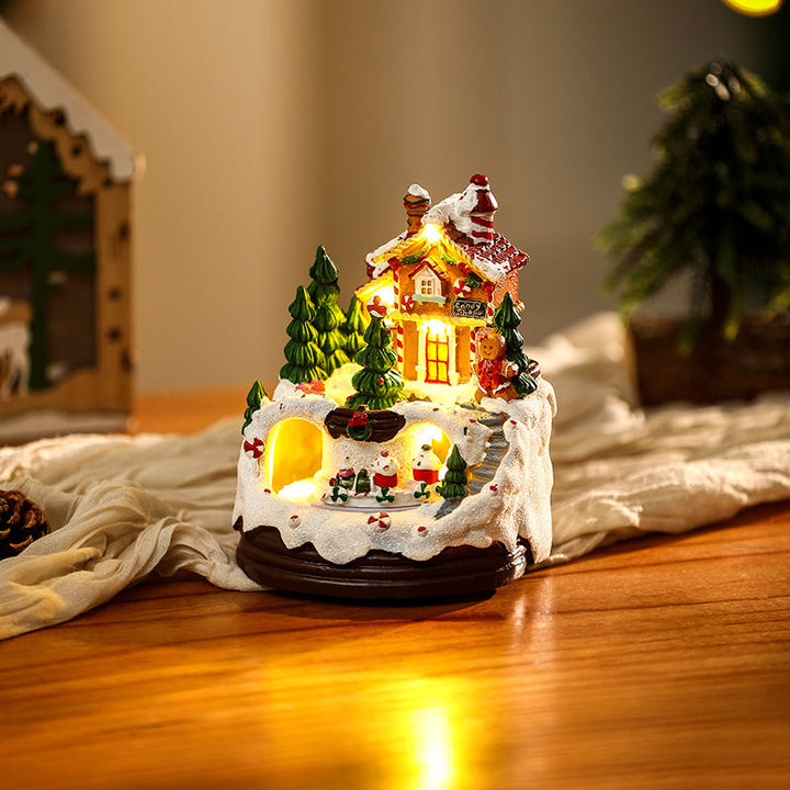 Illuminated Christmas village scene with winter design