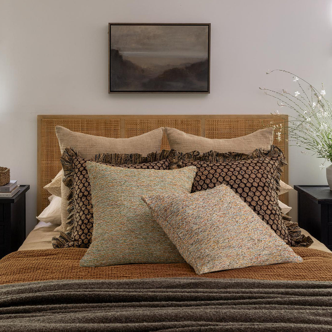 Woven square decorative pillow cover with mottled bouclé structure