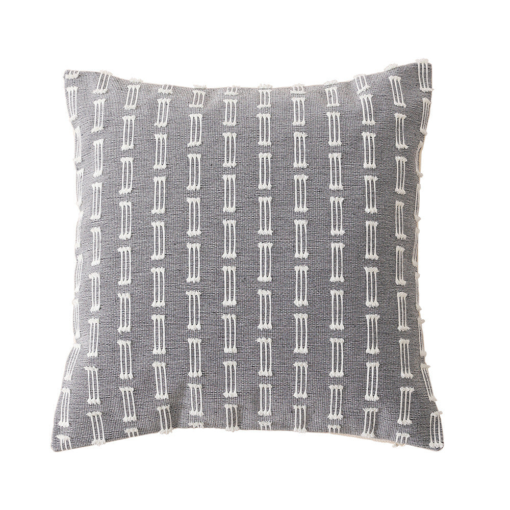 Woven decorative cushion cover with hand-tufted geometric pattern