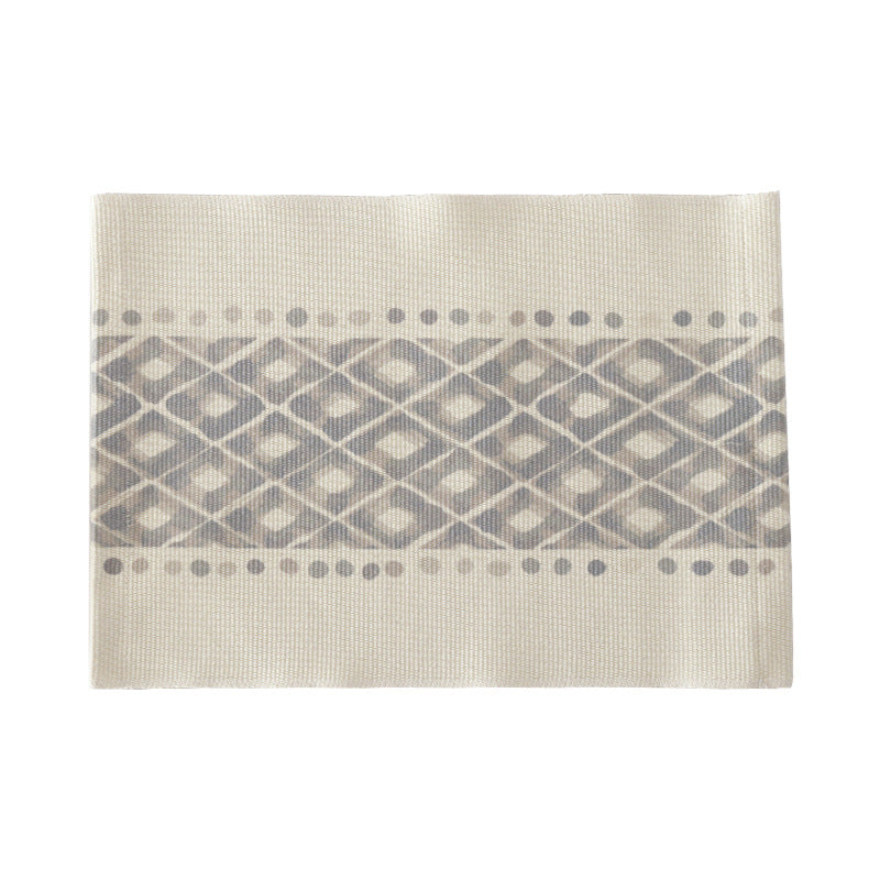 Woven placemat made of cotton blend with geometric diamond trim and fine texture