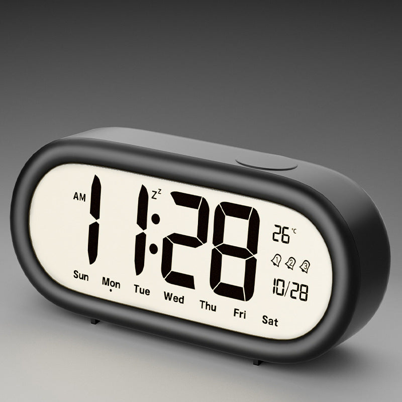 Digital alarm clock with temperature display and alarm function
