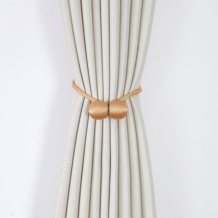 Decorative curtain tieback