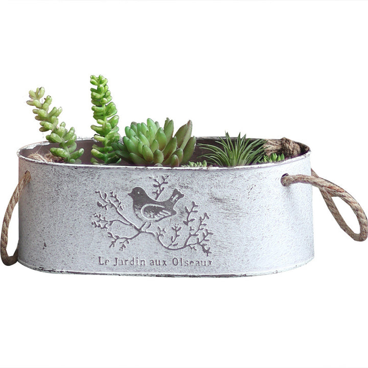 Decorative storage basket made of metal with natural design