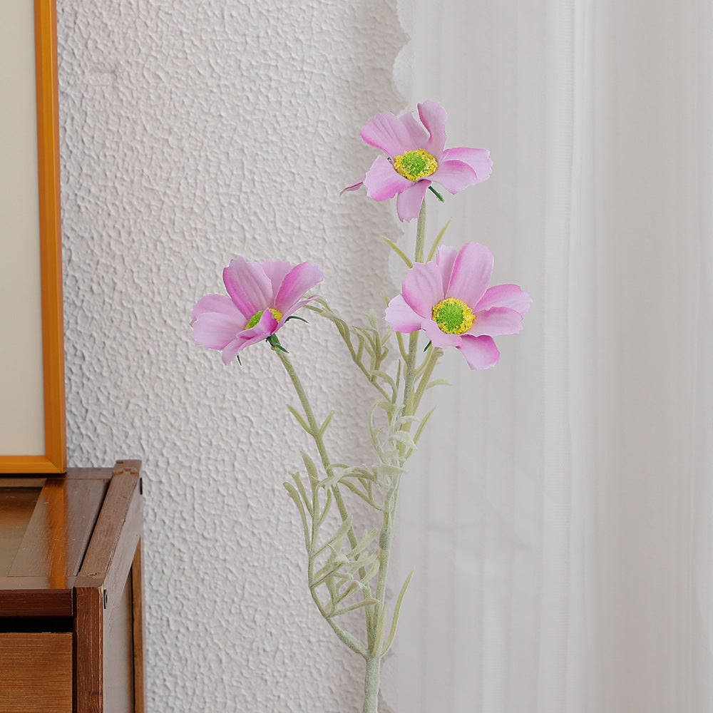 Elegant artificial flower bouquet with intricately detailed blooms