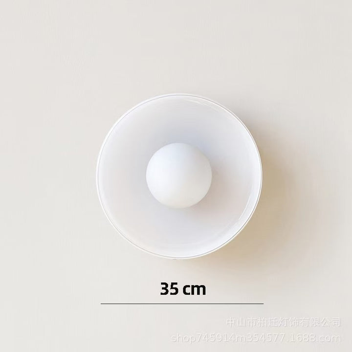 Minimalistic ceramic pendant lamp with layered bell shade